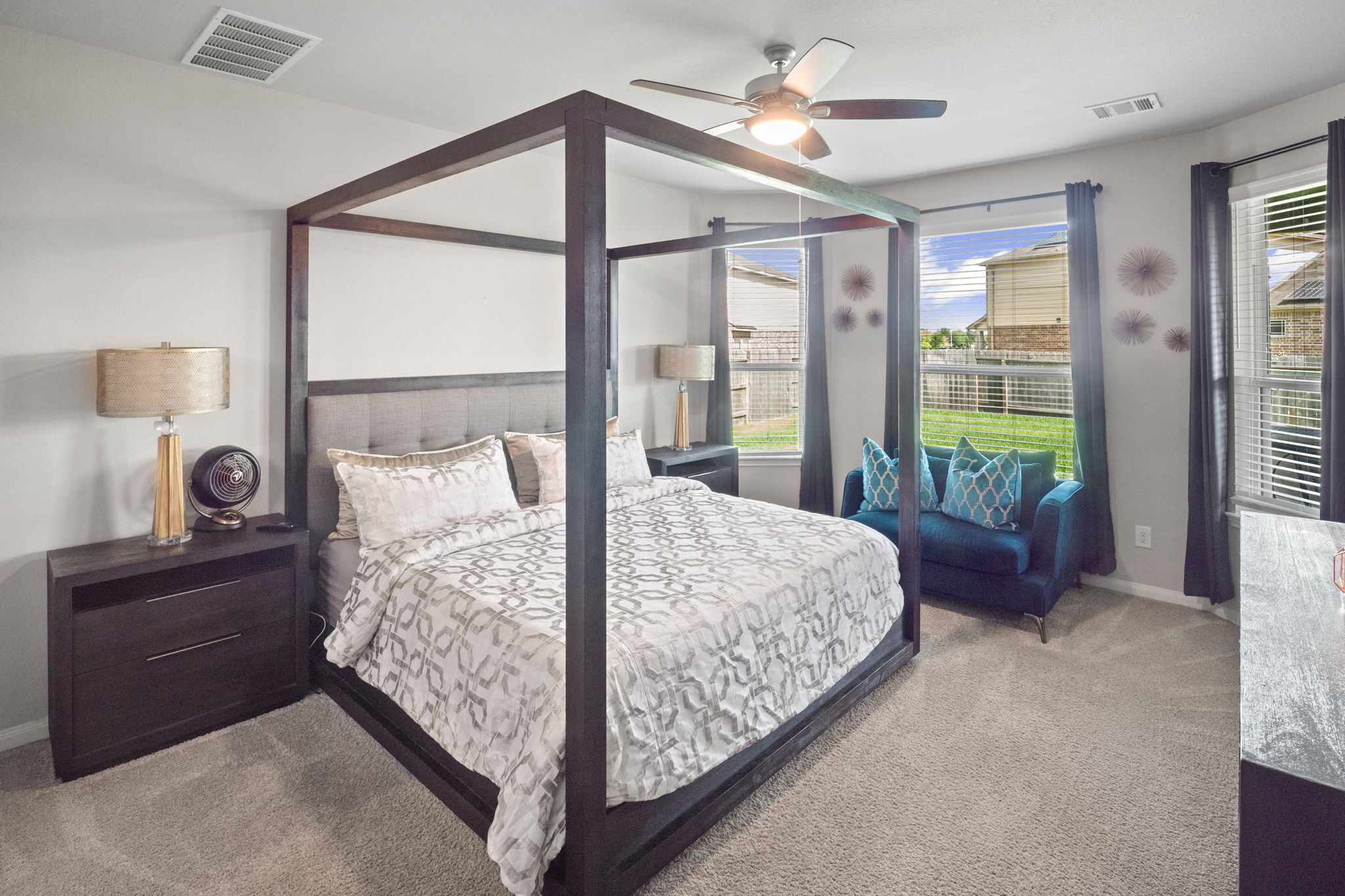 82 Indian Wells Drive Manvel, TX 77578 - Photo 11 of 30 a bed sitting in a bedroom next to a window