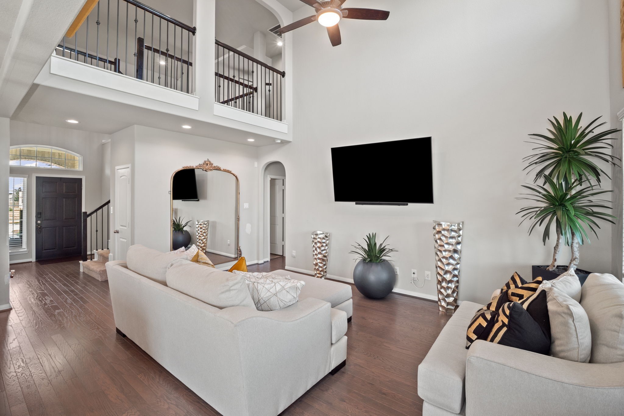 82 Indian Wells Drive Manvel, TX 77578 - Photo 8 of 30 a living room with furniture and a flat screen tv