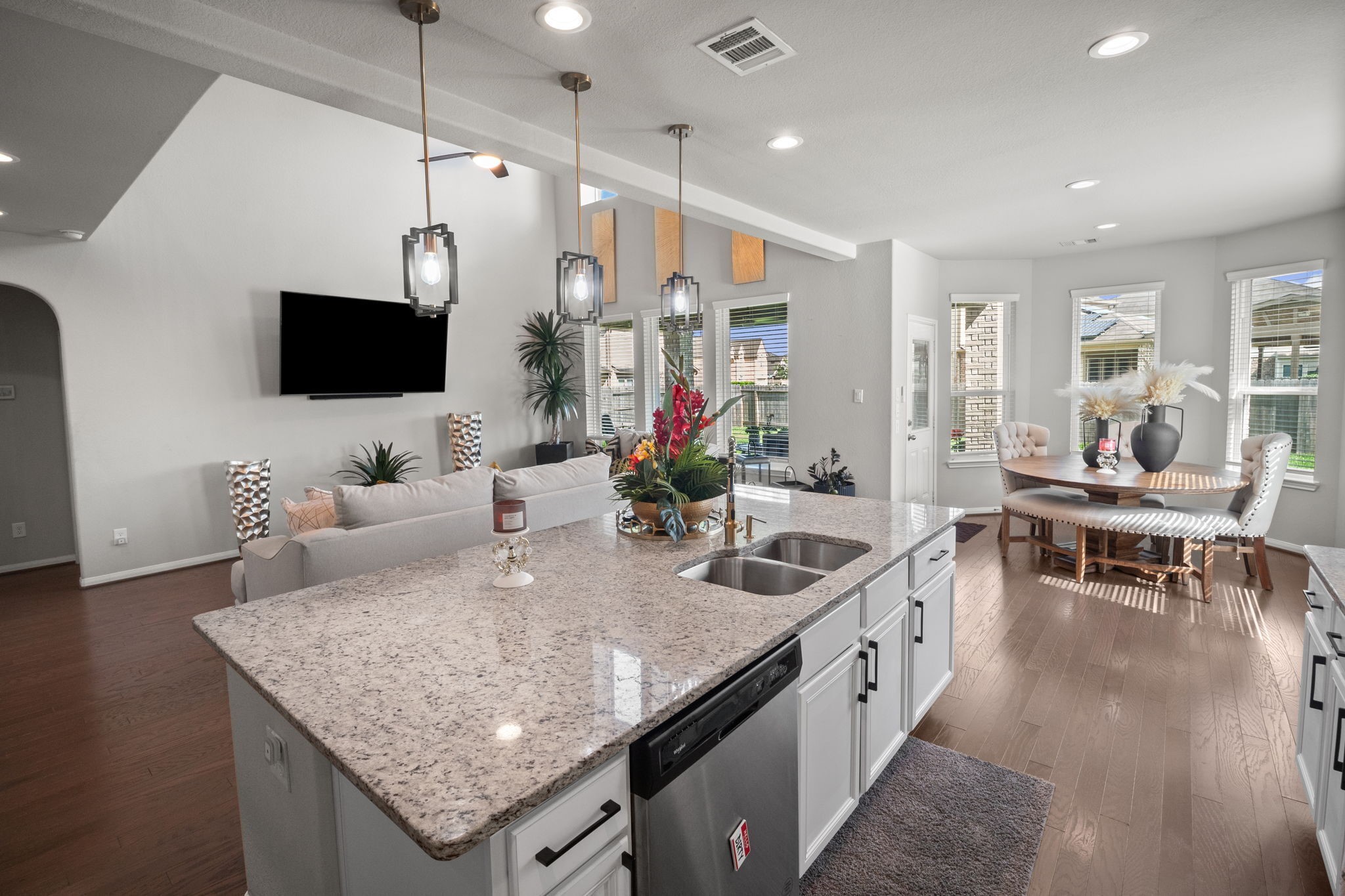82 Indian Wells Drive Manvel, TX 77578 - Photo 10 of 30 a large kitchen with granite countertop a sink and a stove