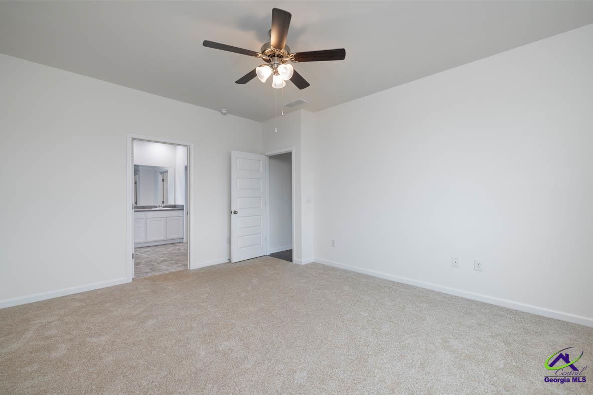 227 Cattle Drive Perry, GA 31069 - Photo 11 of 40 wooden floor in an empty room