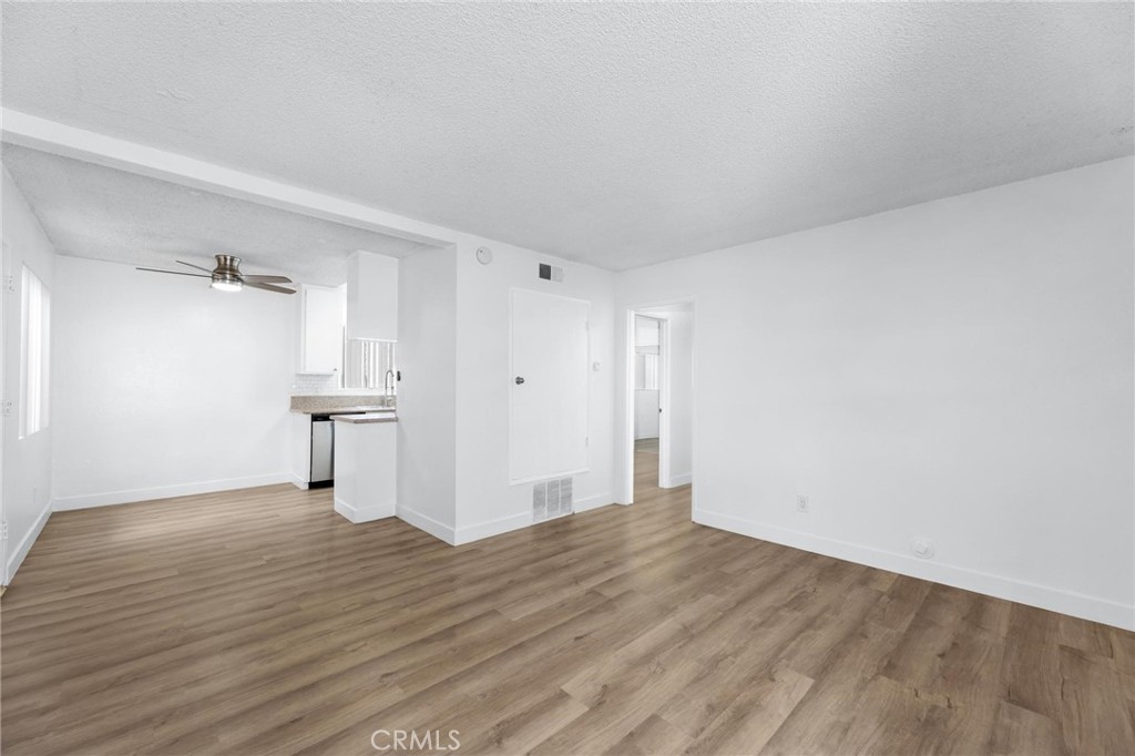 223 Shell Street Manhattan Beach, CA 90266 - Photo 11 of 50 a view of empty room with wooden floor