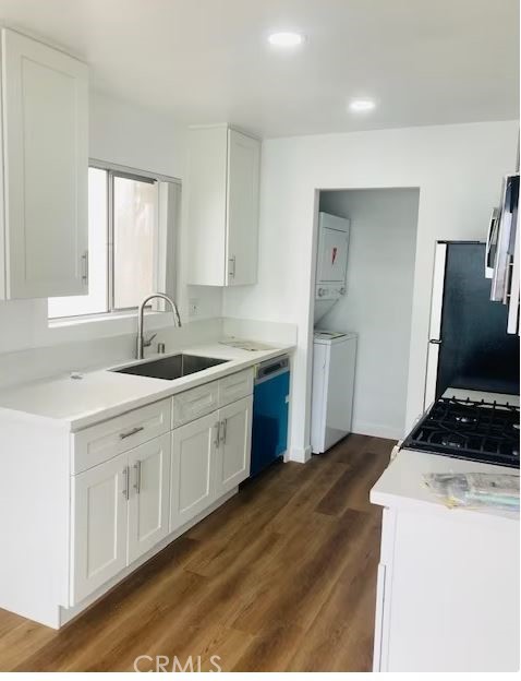 223 Shell Street Manhattan Beach, CA 90266 - Photo 36 of 50 a kitchen that has a sink and a stove in it