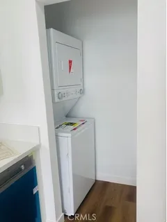 a living room with furniture and a ceiling fan