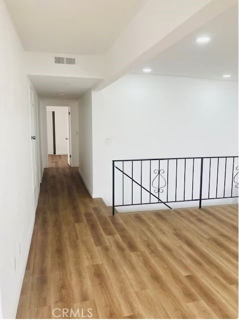 223 Shell Street Manhattan Beach, CA 90266 - Photo 39 of 50 a view of a big room with wooden floor and windows