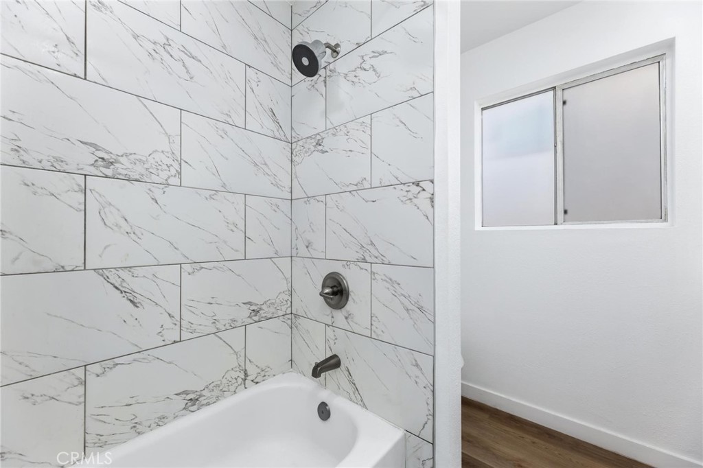 223 Shell Street Manhattan Beach, CA 90266 - Photo 48 of 50 a bathroom with a bathtub and shower