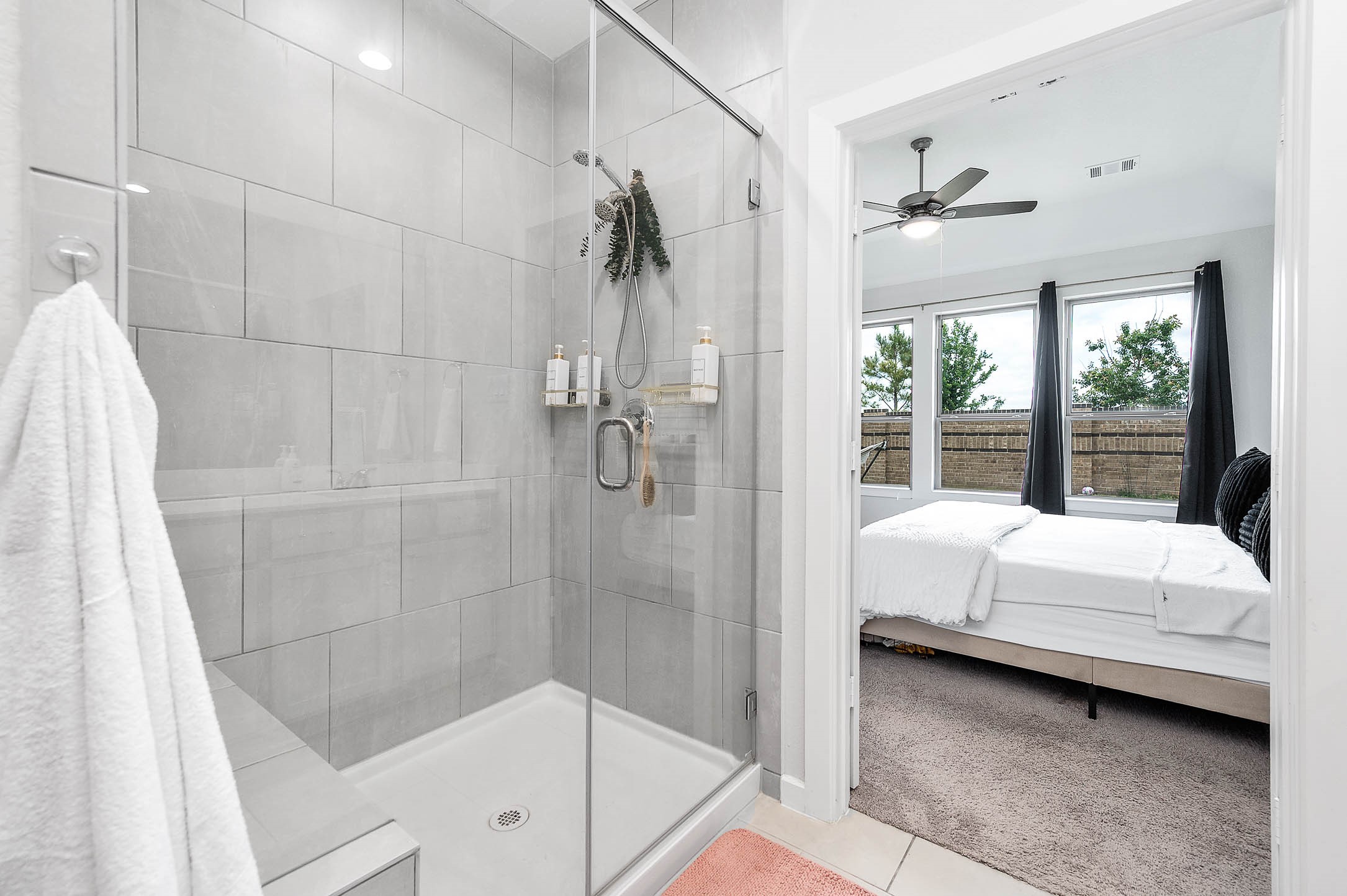 10926 Wander Way Beasley, TX 77417 - Photo 15 of 38 a bathroom with a tub shower and sink
