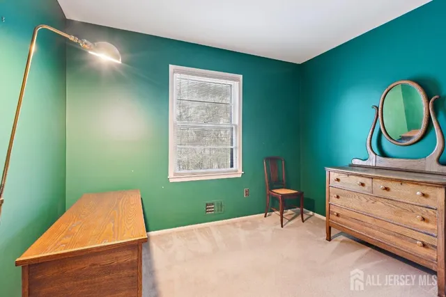 a room with furniture and a window