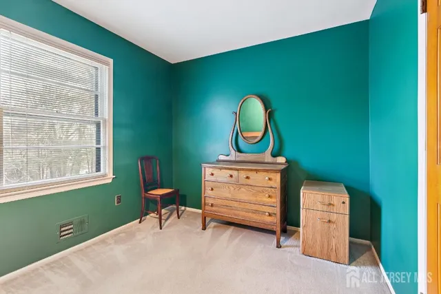 a room with furniture and a window