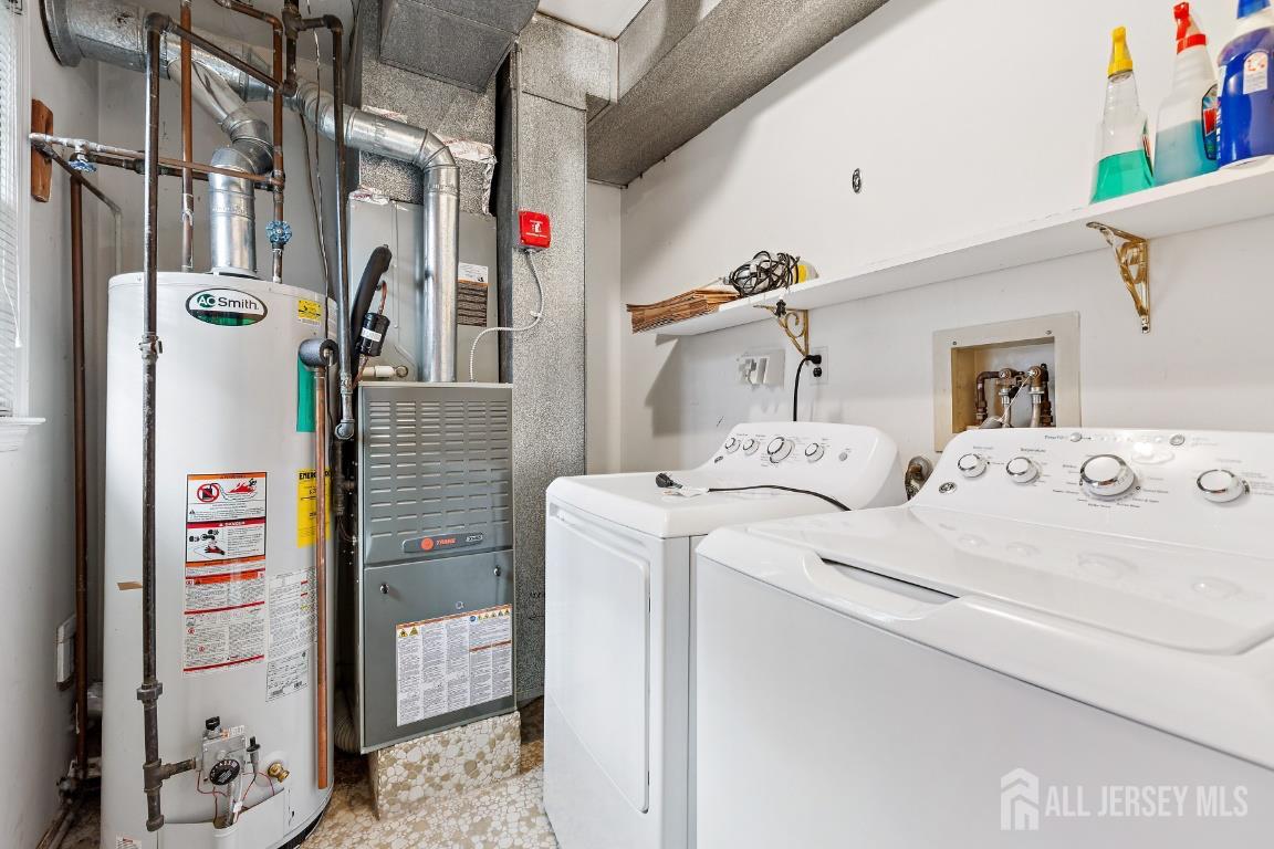 18 Rachele Court Old Bridge, NJ 07747 - Photo 19 of 22 a utility room with dryer and washer