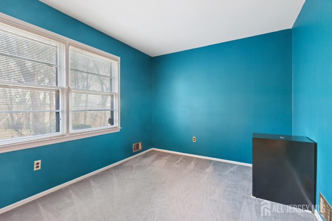 18 Rachele Court Old Bridge, NJ 07747 - Photo 20 of 22 an empty room with a window