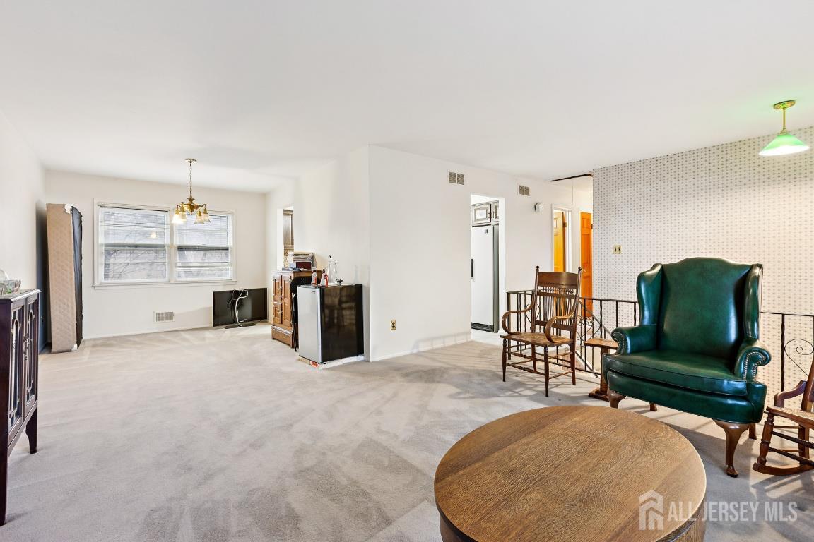 18 Rachele Court Old Bridge, NJ 07747 - Photo 6 of 22 a living room with furniture and a table