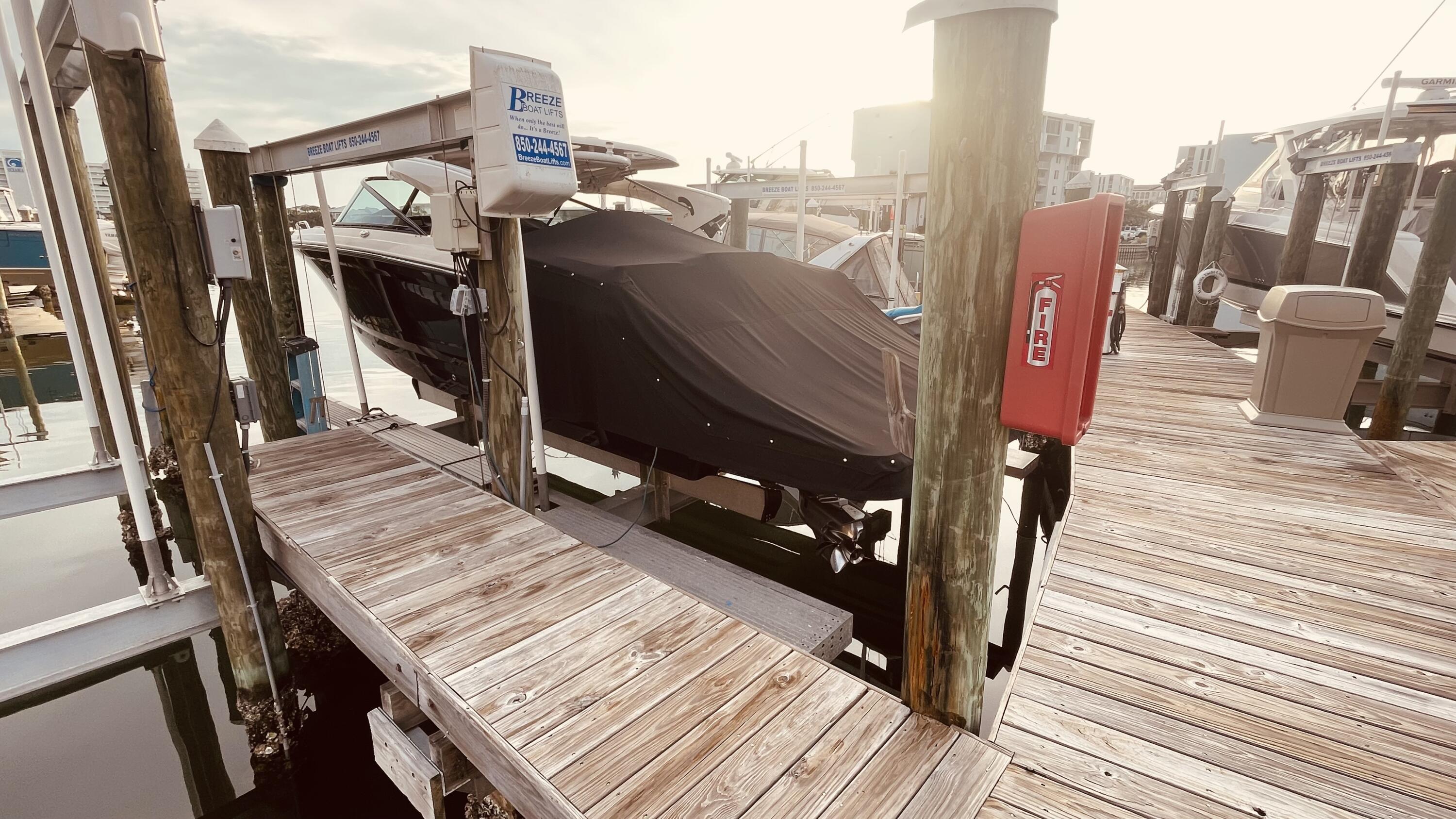 770 Harbor Boulevard, Unit SLIP D7 Destin, FL 32541 - Photo 4 of 5 a view of a balcony with wooden floor