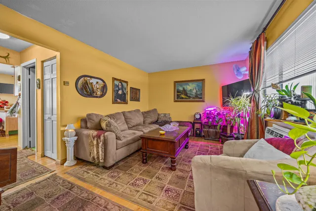 a living room with furniture and a couch