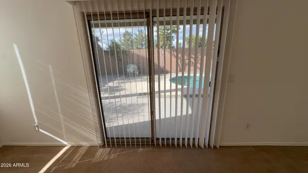 a bathroom with a glass door