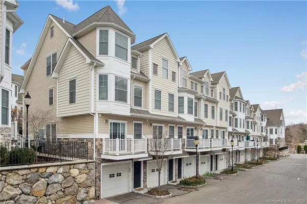 a front view of a building with glass windows