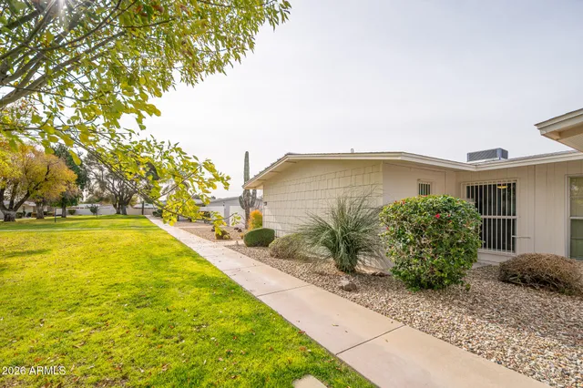 a view of swimming pool with outdoor seating