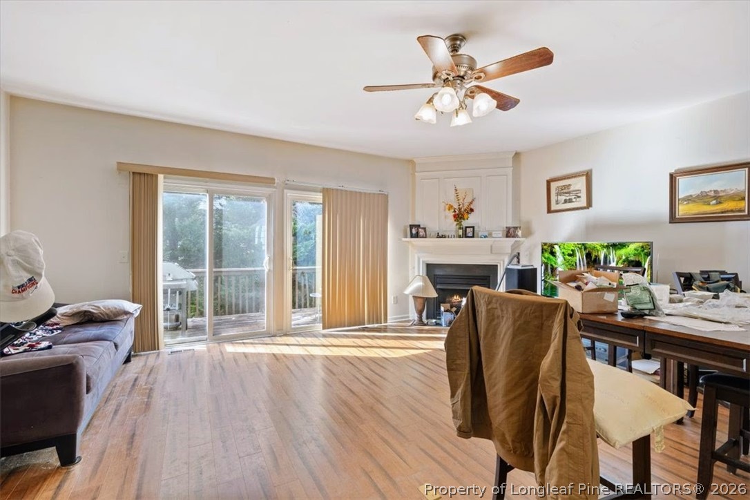 7233 Galon Glen Road Raleigh, NC 27613 - Photo 2 of 6 a living room with furniture and a fireplace