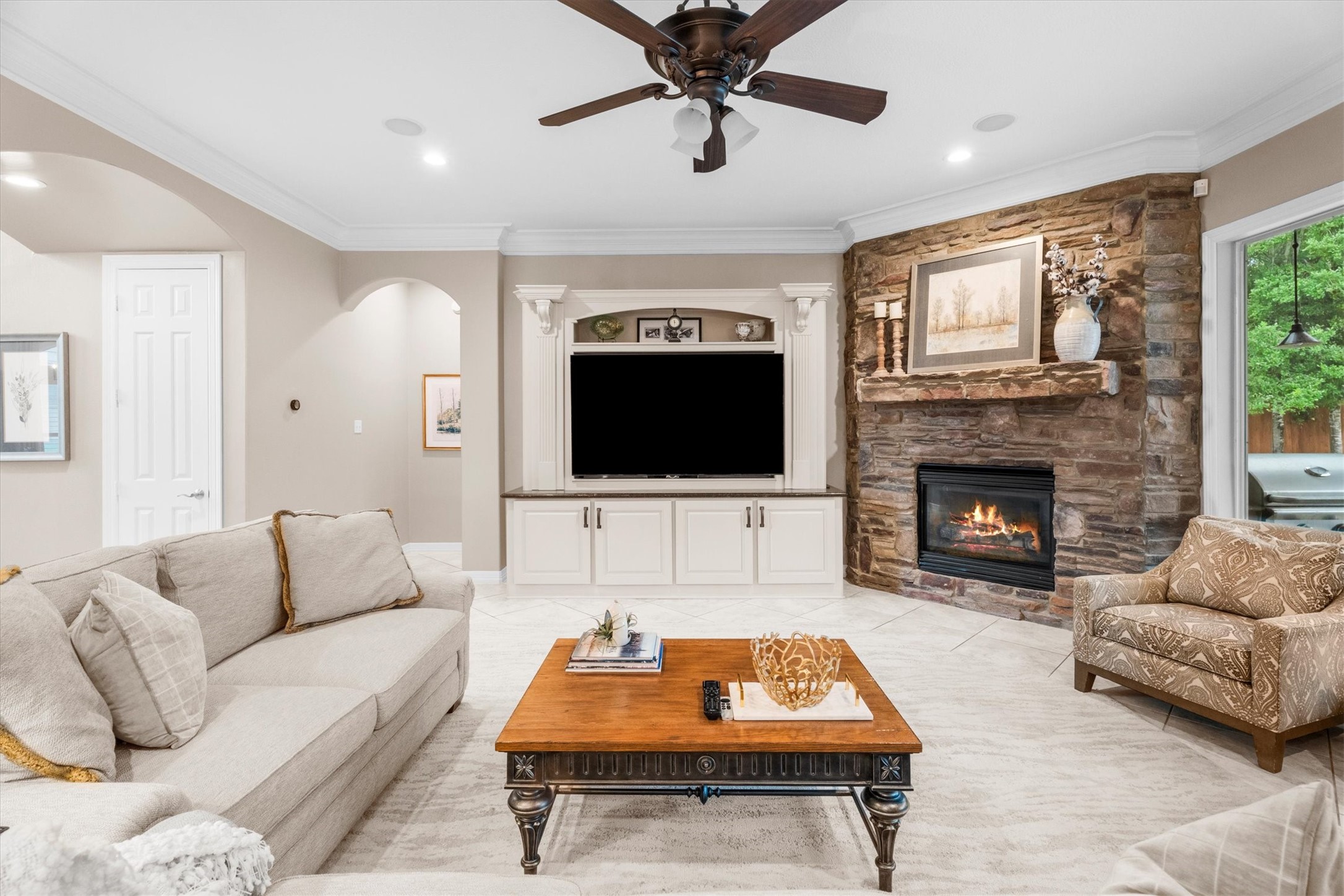 15415 Prade Ranch Lane Cypress, TX 77429 - Photo 15 of 50 Corner Rock fireplace and upgraded TV console