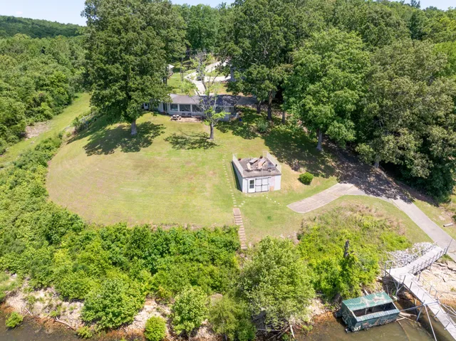 a view of a back yard of the house