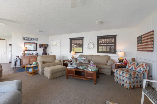 a kitchen with stainless steel appliances granite countertop a stove and a refrigerator