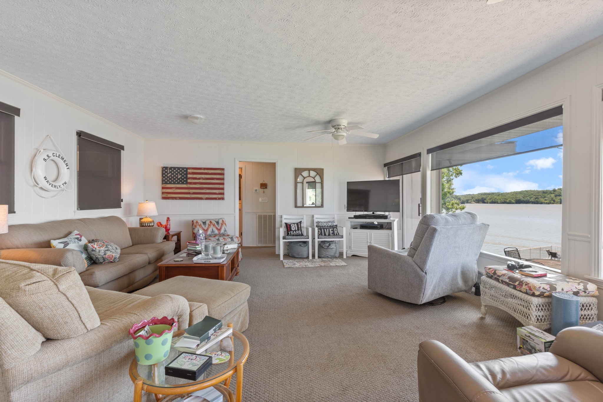 440 Bluff Point Lane Waverly, TN 37185 - Photo 12 of 97 a living room with furniture and a large window