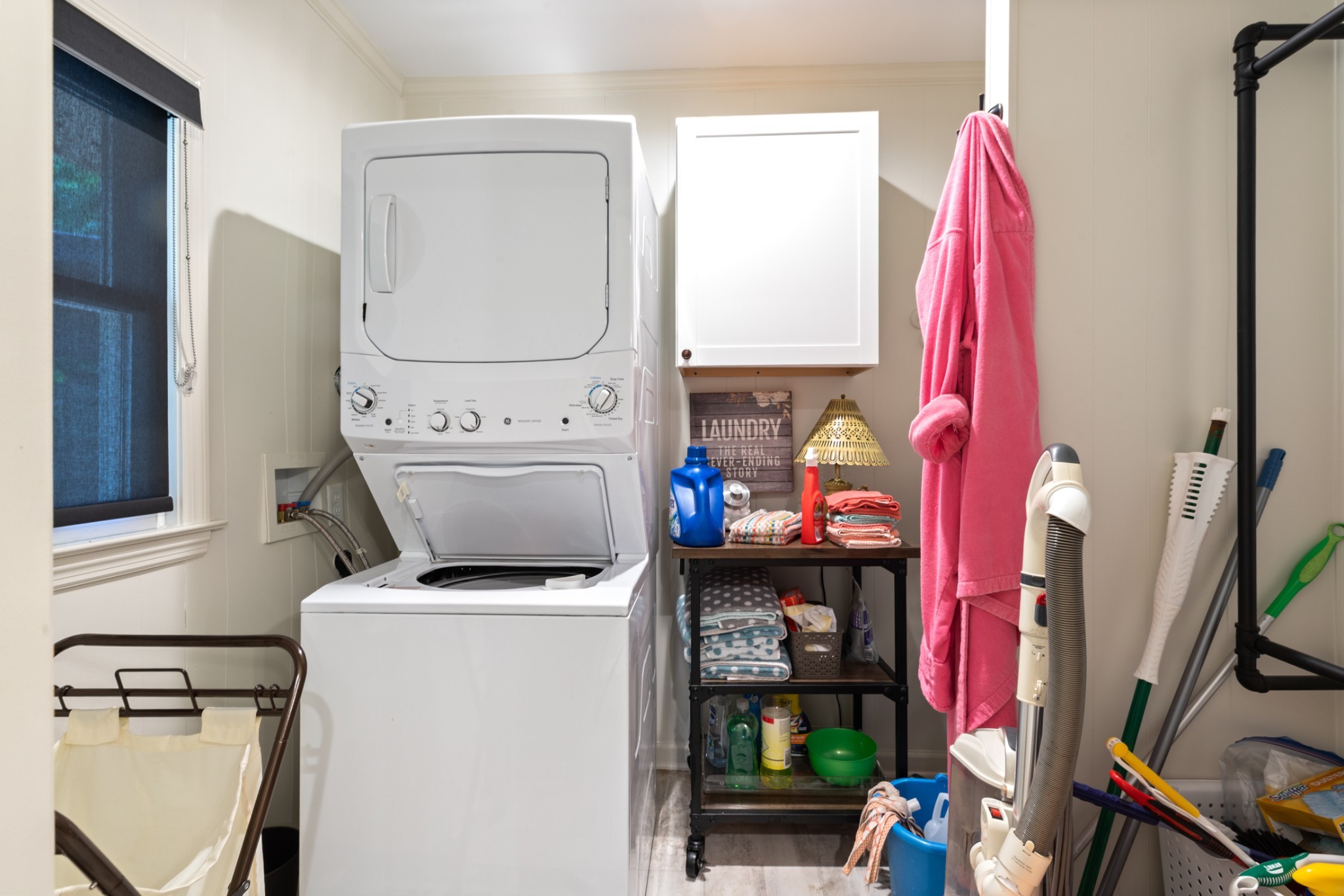 440 Bluff Point Lane Waverly, TN 37185 - Photo 23 of 97 a view of walk in closet with clothes and washer