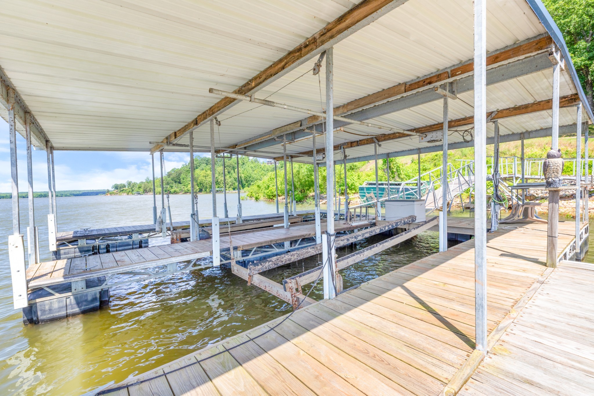 440 Bluff Point Lane Waverly, TN 37185 - Photo 39 of 97 a view of a swimming pool with a patio