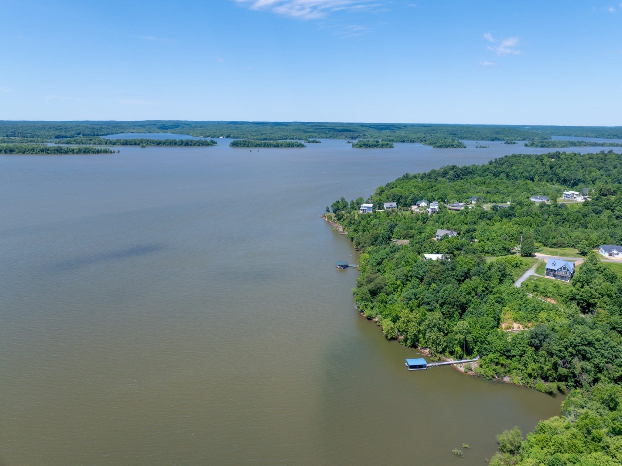 440 Bluff Point Lane Waverly, TN 37185 - Photo 48 of 97 a view of a lake with a outdoor space
