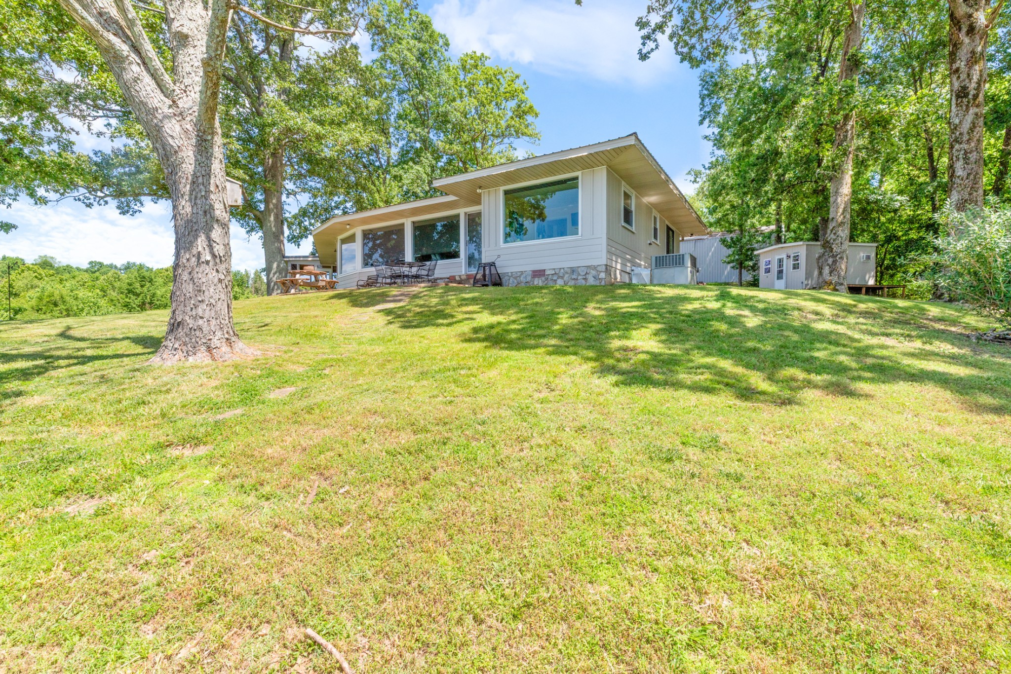 440 Bluff Point Lane Waverly, TN 37185 - Photo 5 of 97 a view of a house with a backyard