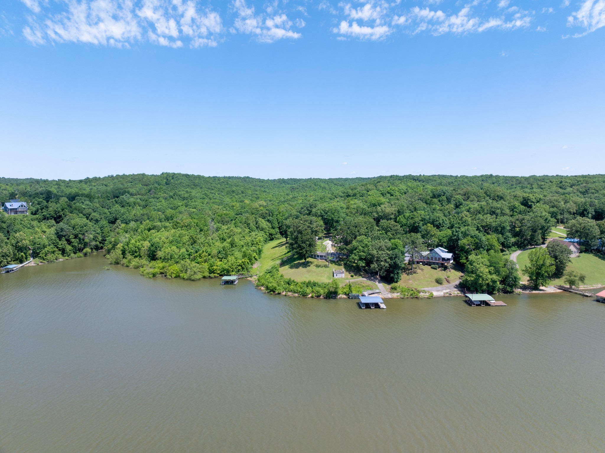 440 Bluff Point Lane Waverly, TN 37185 - Photo 53 of 97 a view of a lake with a city