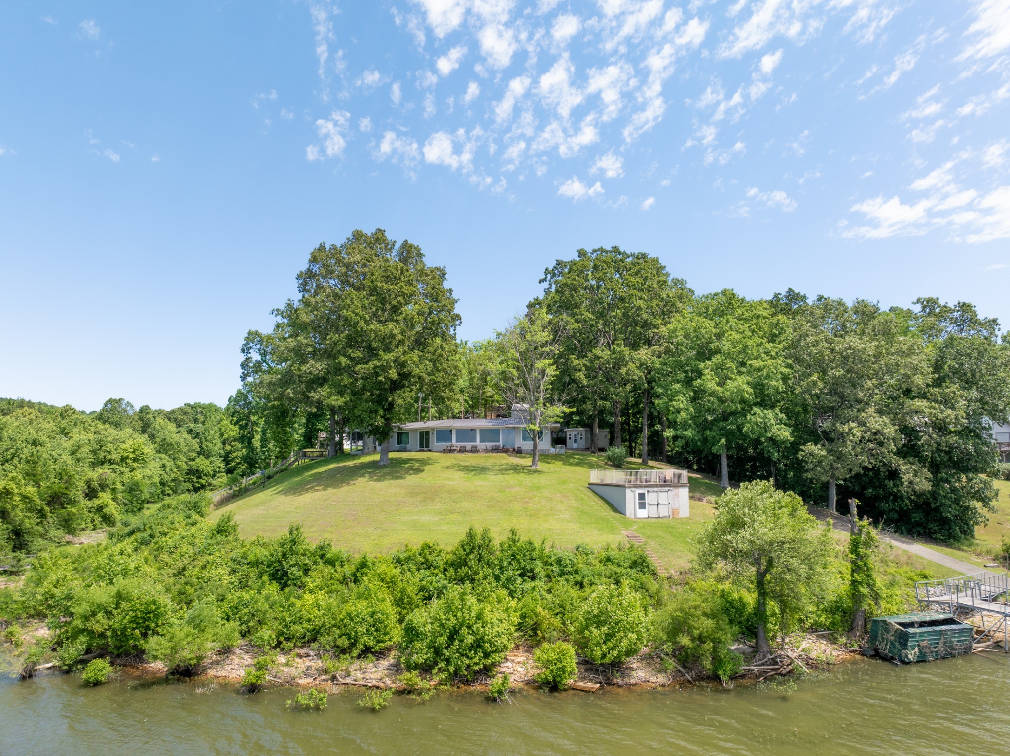 440 Bluff Point Lane Waverly, TN 37185 - Photo 74 of 97 a view of a swimming pool with an outdoor space and seating area