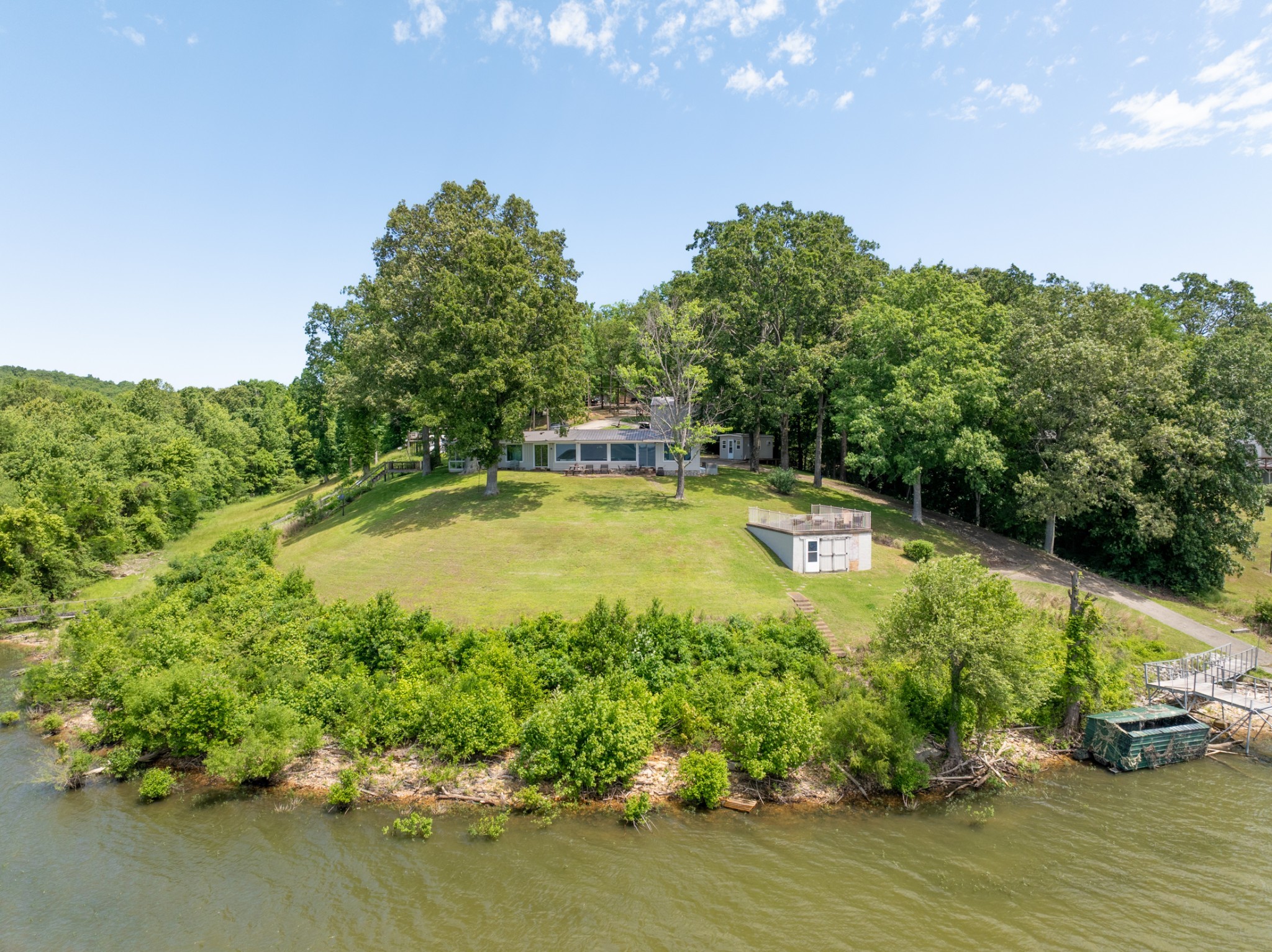 440 Bluff Point Lane Waverly, TN 37185 - Photo 75 of 97 a view of a swimming pool with an outdoor space and seating area