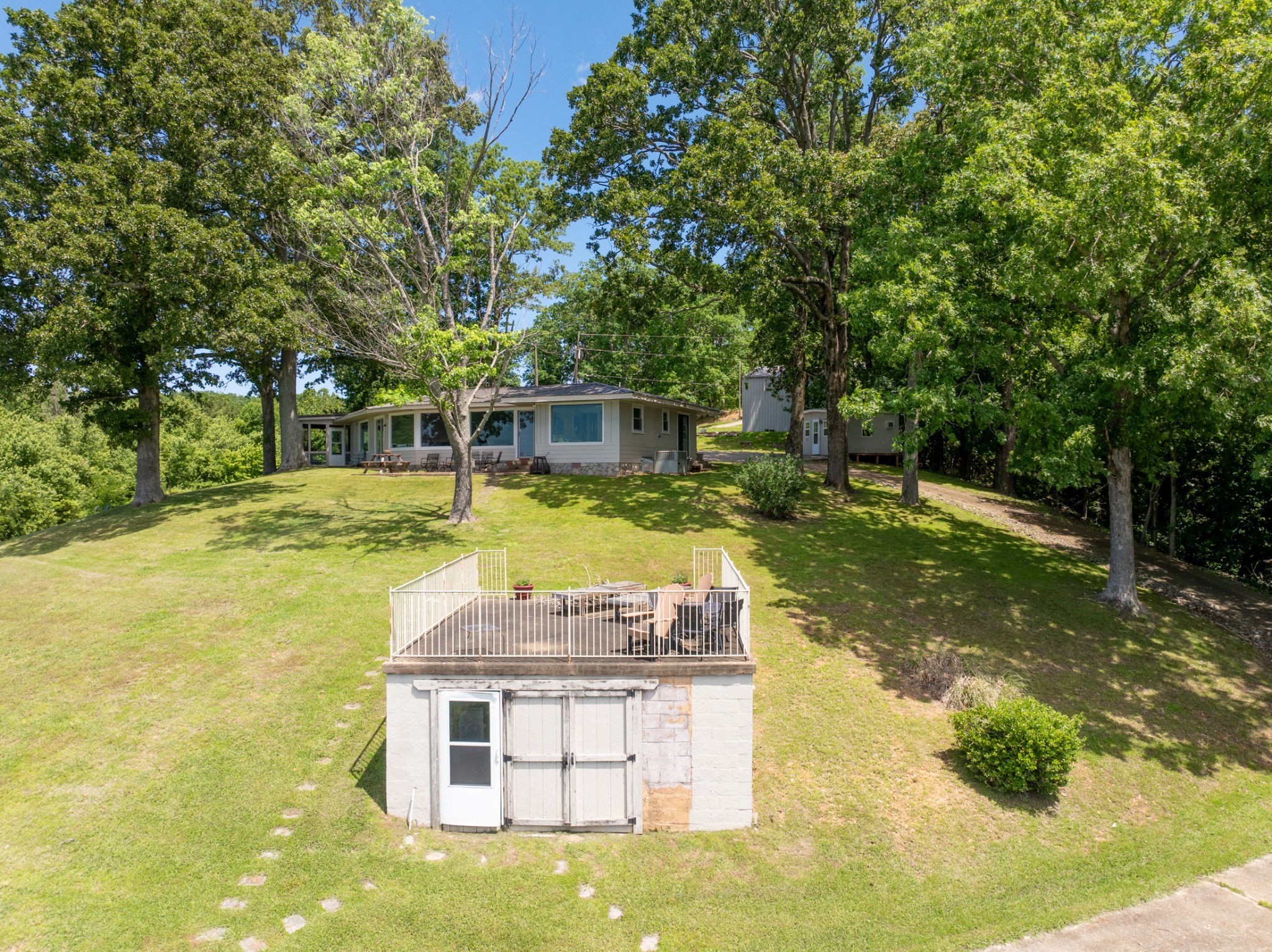 440 Bluff Point Lane Waverly, TN 37185 - Photo 78 of 97 a view of a swimming pool with a patio