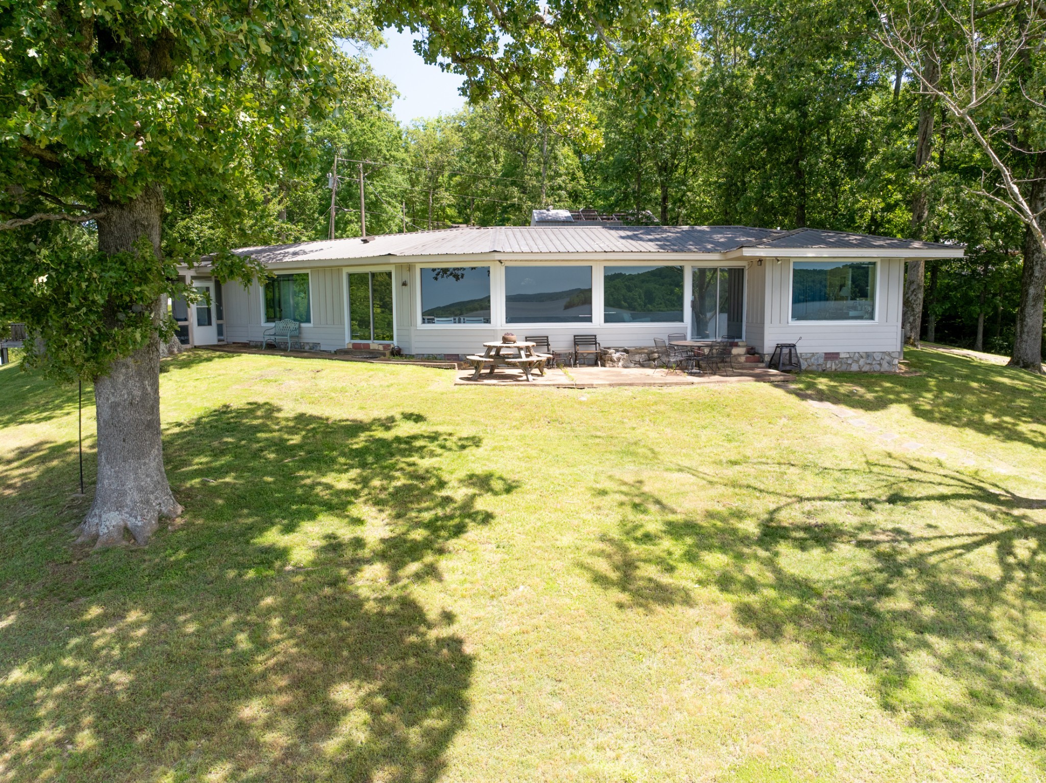 440 Bluff Point Lane Waverly, TN 37185 - Photo 83 of 97 a front view of house with yard seating and yard