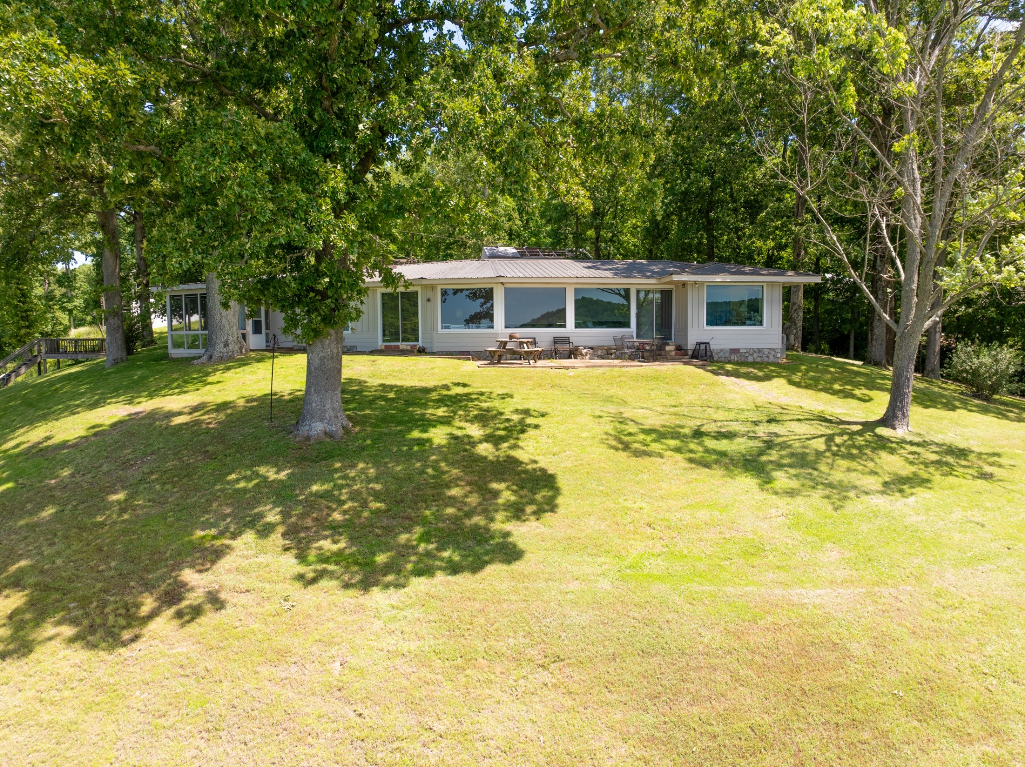 440 Bluff Point Lane Waverly, TN 37185 - Photo 85 of 97 a front view of a house with a yard