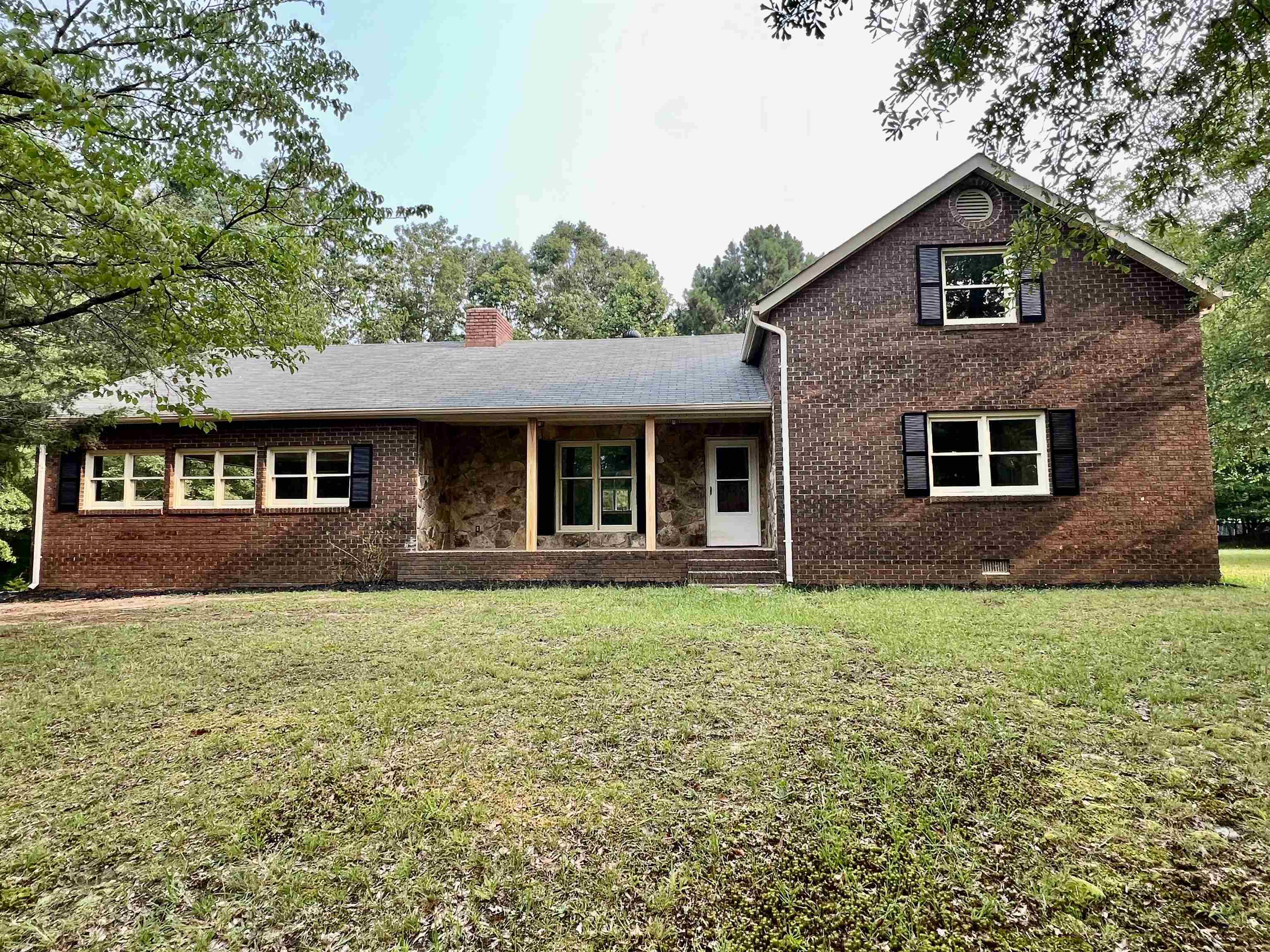 7335 A Bill Wilson Road Lula, GA 30554 - Photo 1 of 1 a front view of a house with a garden