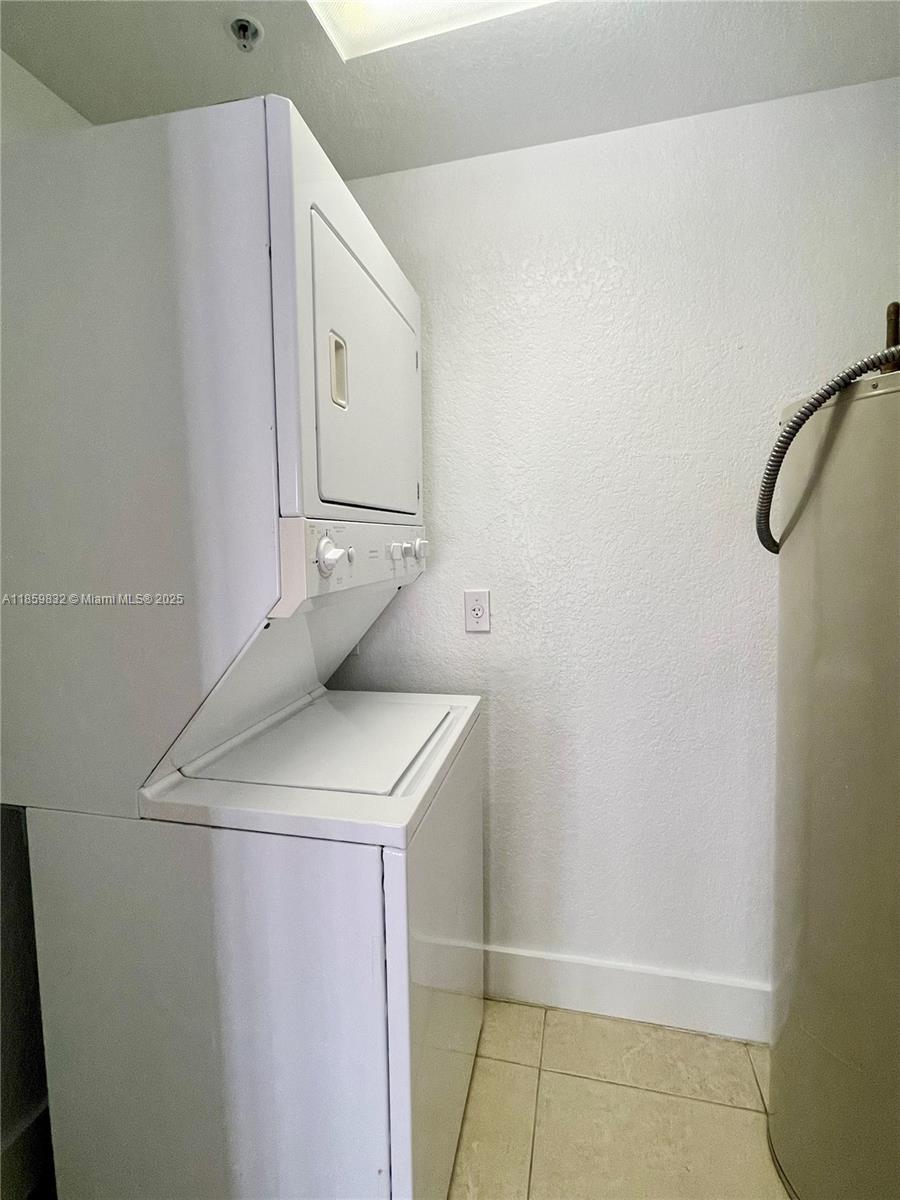 3204 Bird Avenue, Unit 105 Miami, FL 33133 - Photo 12 of 64 a utility room with dryer and washer