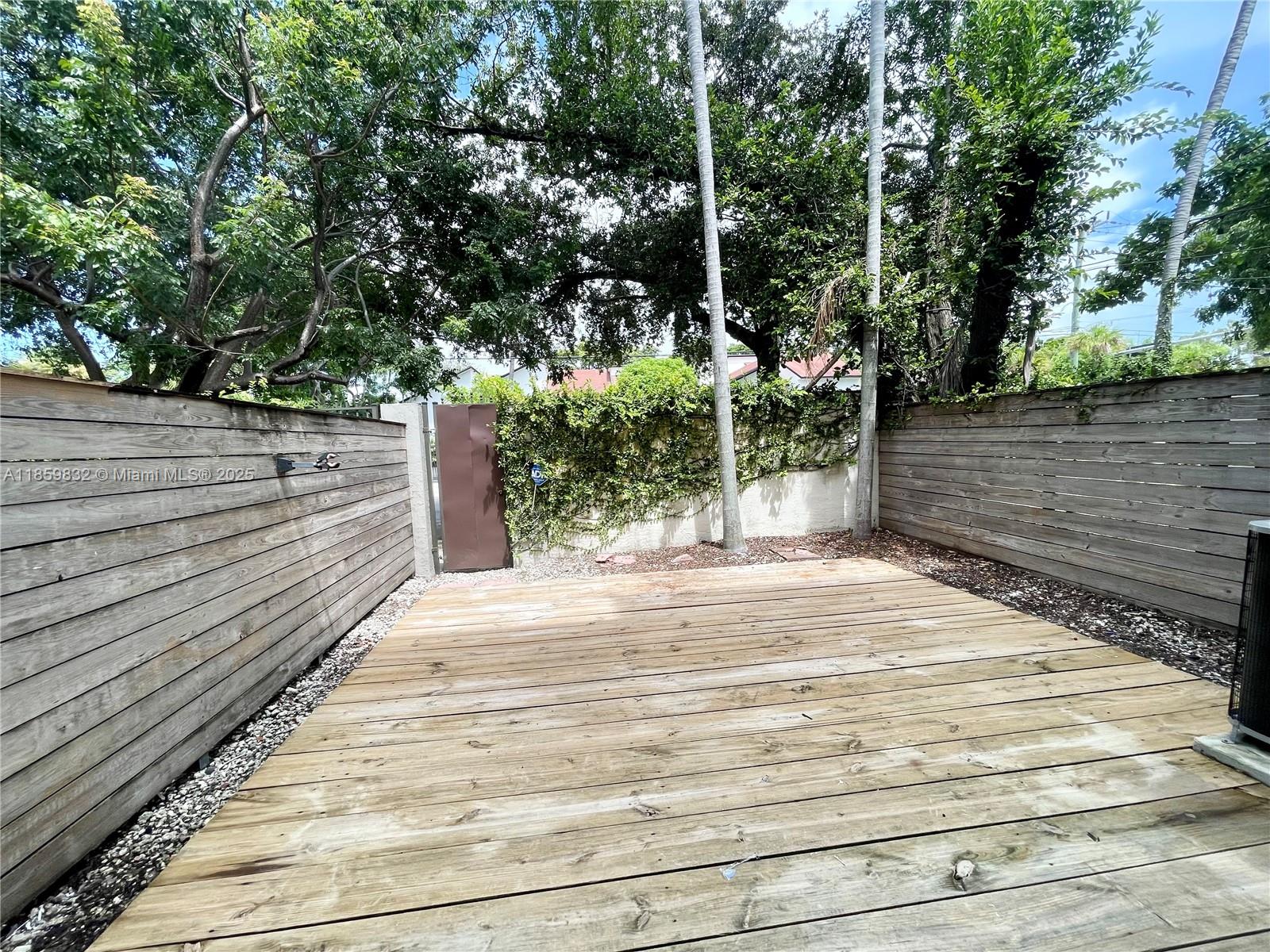3204 Bird Avenue, Unit 105 Miami, FL 33133 - Photo 15 of 64 a view of a pathway both side of house