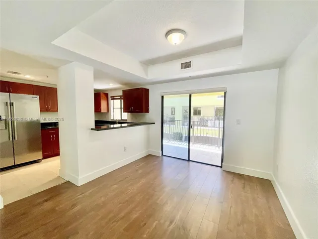 a view of balcony with furniture