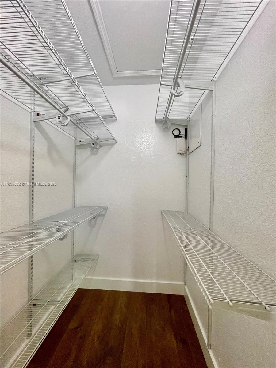 3204 Bird Avenue, Unit 105 Miami, FL 33133 - Photo 43 of 64 a view of a room with racks on the wall