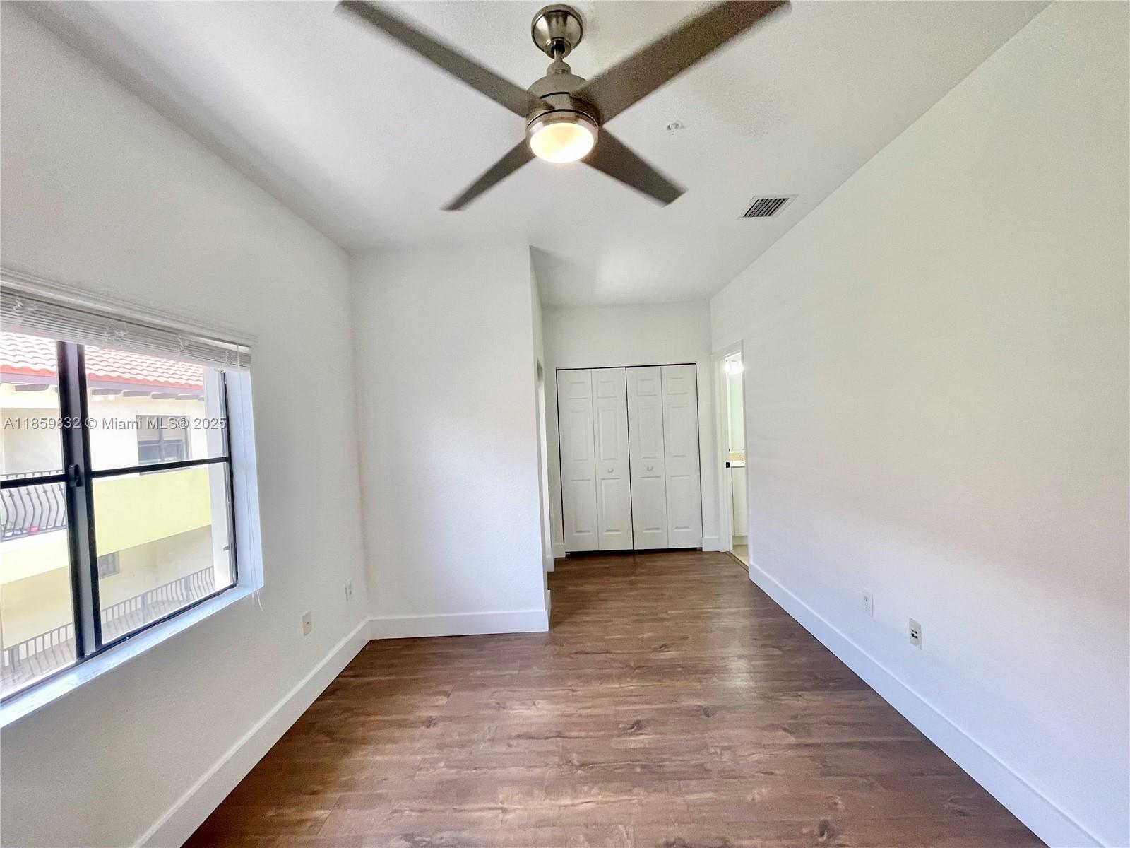 3204 Bird Avenue, Unit 105 Miami, FL 33133 - Photo 59 of 64 a view of an empty room with a window
