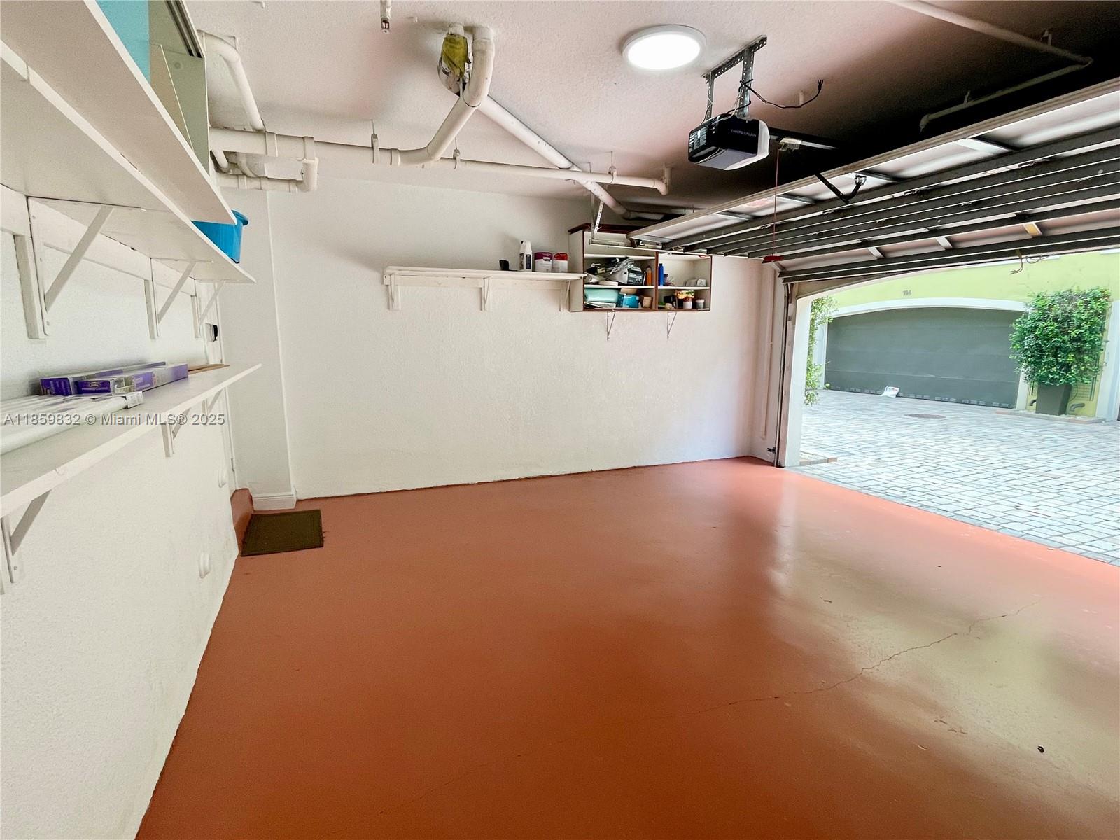 3204 Bird Avenue, Unit 105 Miami, FL 33133 - Photo 7 of 64 a view of a garage with a fireplace