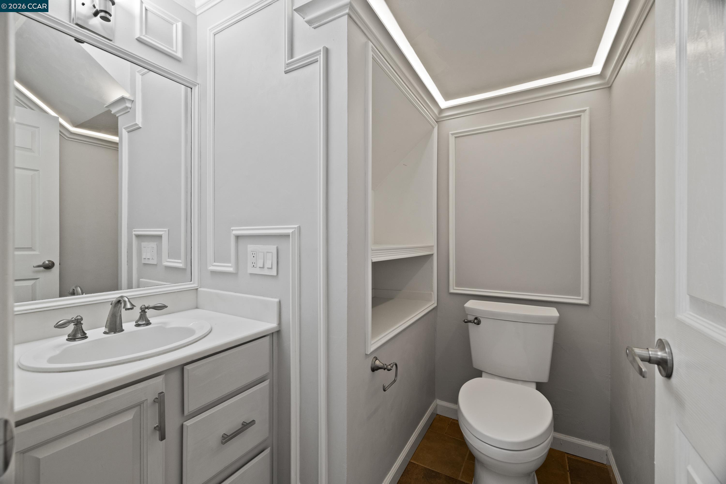 564 Pimlico Court Walnut Creek, CA 94597 - Photo 12 of 19 a bathroom with a sink toilet and vanity