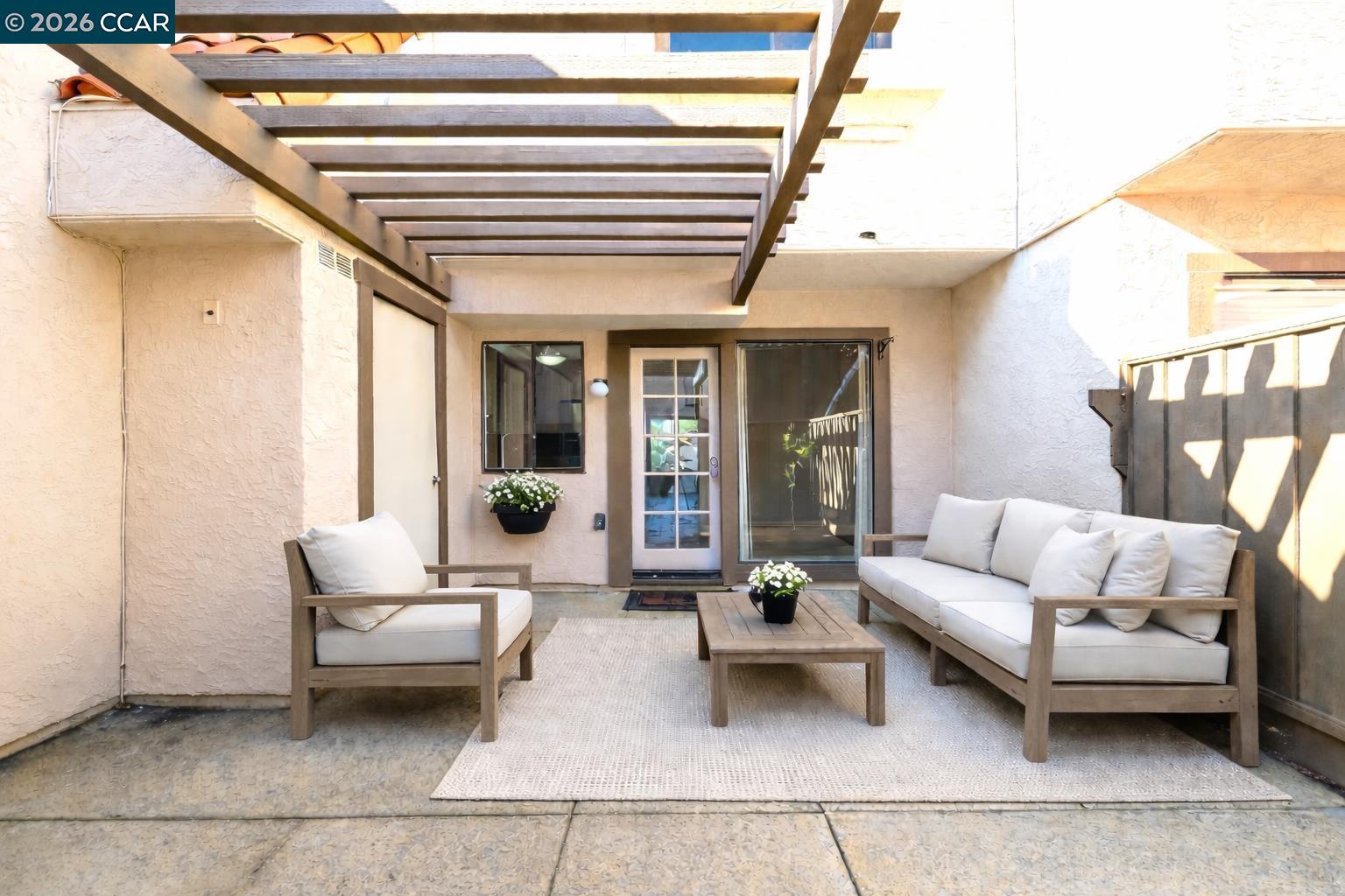 564 Pimlico Court Walnut Creek, CA 94597 - Photo 16 of 19 a living room with furniture and white walls