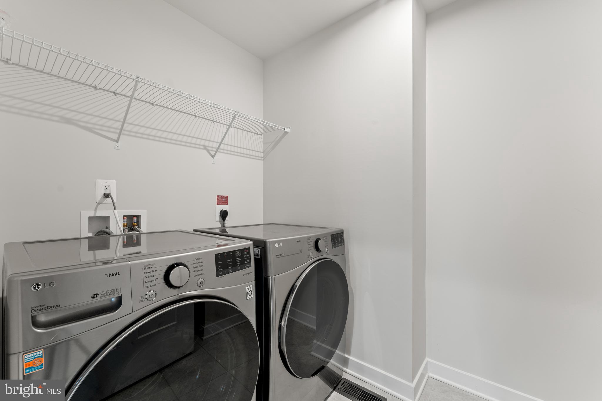 18332 Signature Way Ruther Glen, VA 22546 - Photo 15 of 50 a utility room with dryer and washer