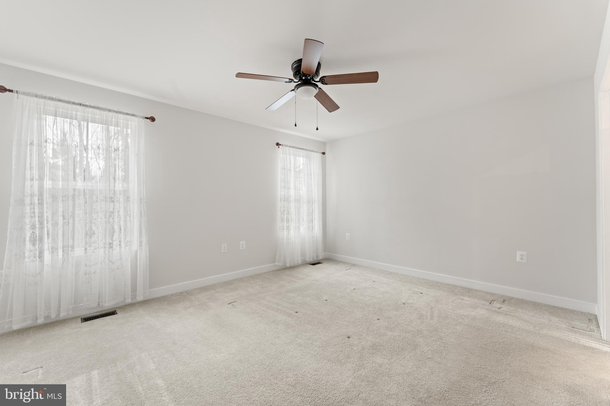 18332 Signature Way Ruther Glen, VA 22546 - Photo 16 of 50 a view of an empty room with a window
