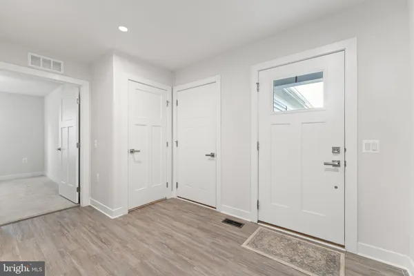 wooden floor & windows in a room