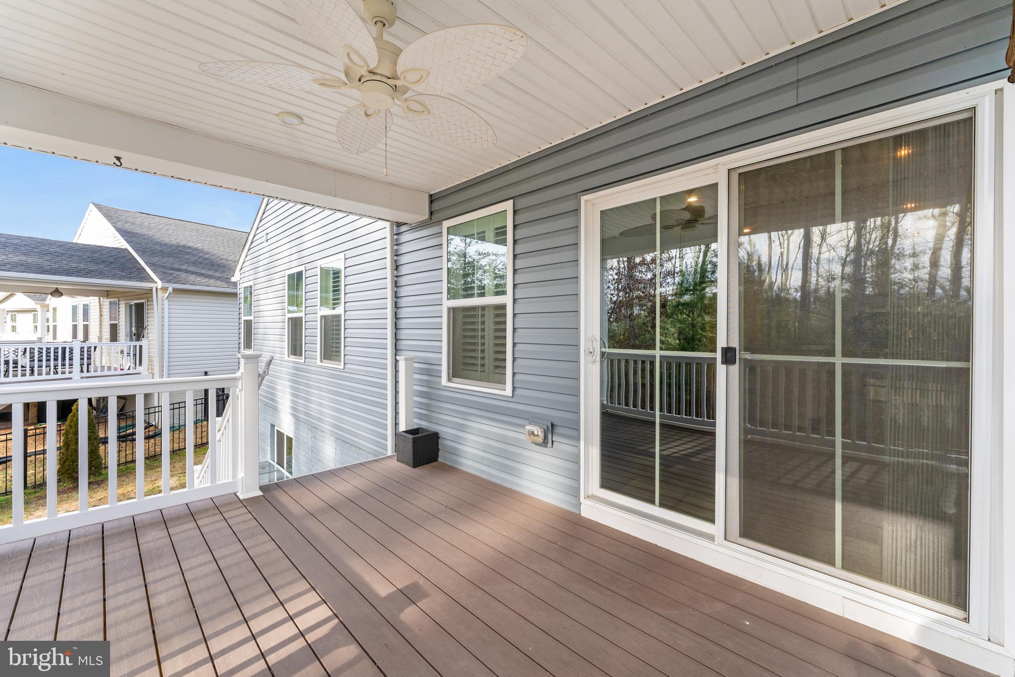 18332 Signature Way Ruther Glen, VA 22546 - Photo 39 of 50 a view of empty room with wooden floor and fan