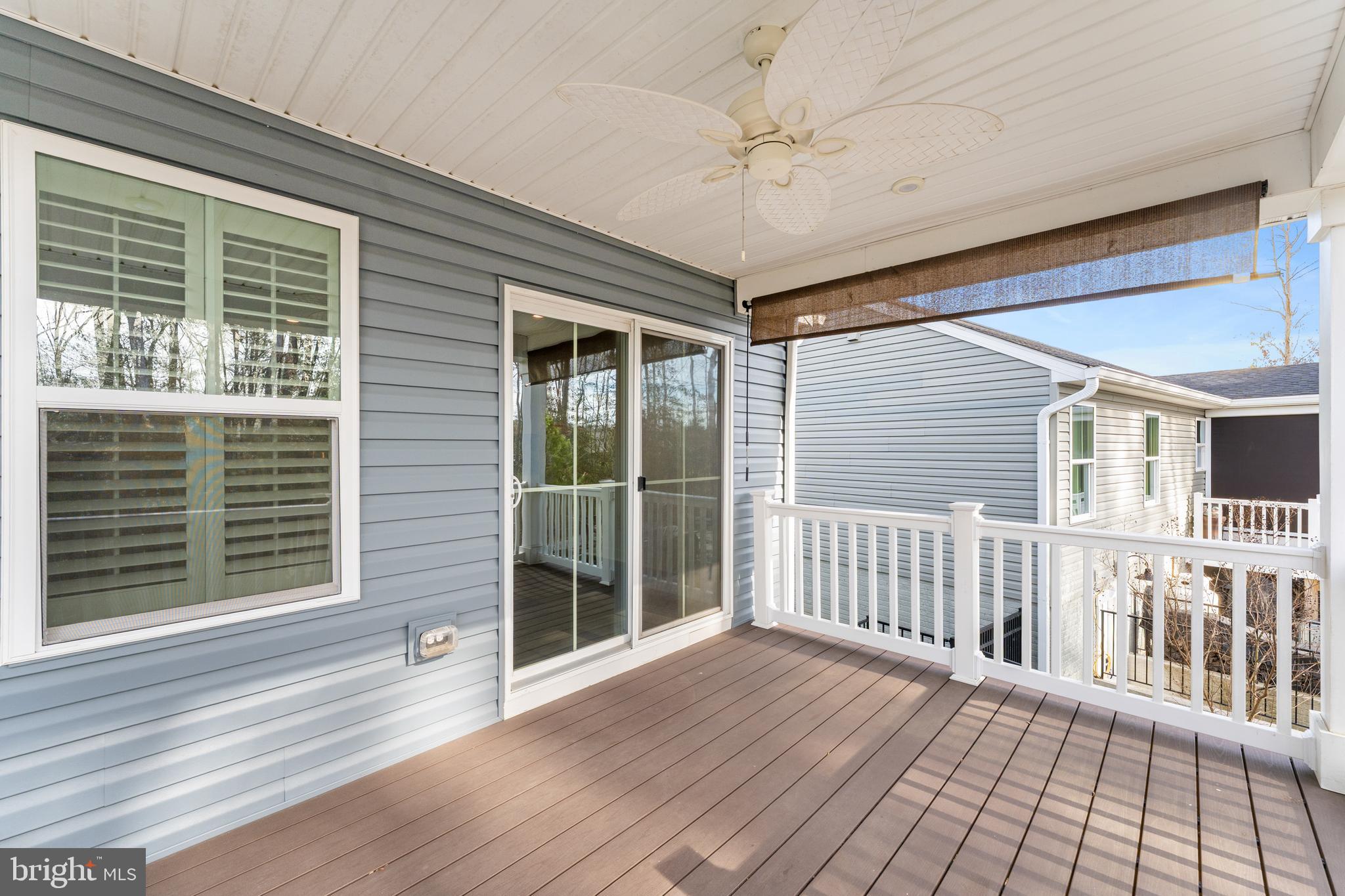 18332 Signature Way Ruther Glen, VA 22546 - Photo 40 of 50 a view of a house with a balcony