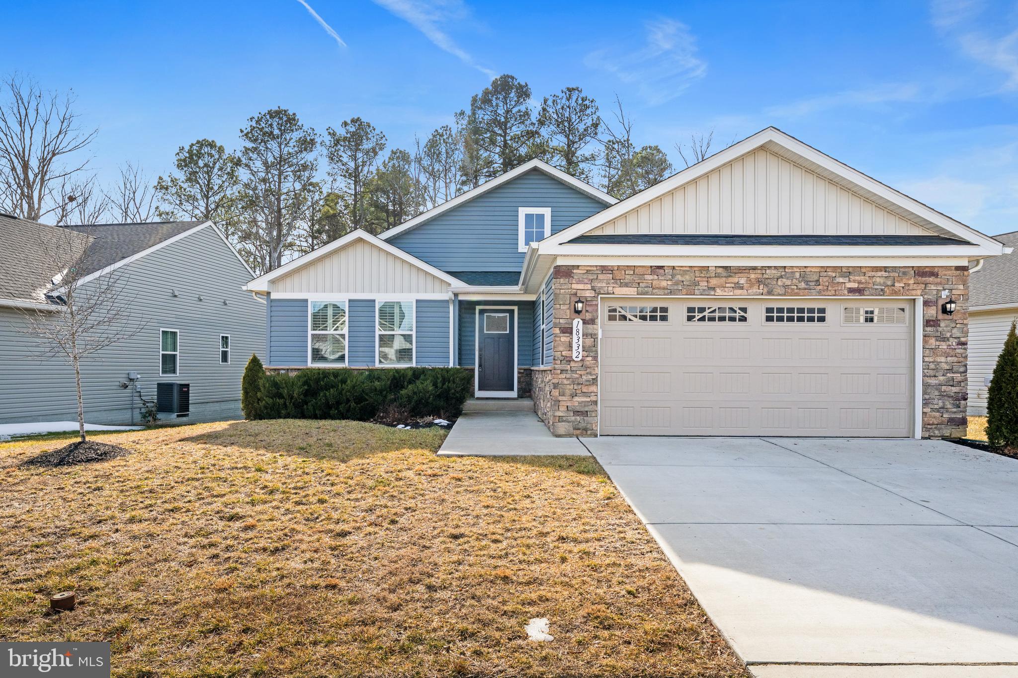 18332 Signature Way Ruther Glen, VA 22546 - Photo 42 of 50 a front view of a house with a yard